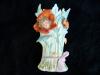BISQUE VICTORIAN VASE w/ CHILD'S HEAD in FLOWER 